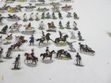 a lot of figurines that are on a table