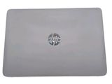 an image of a close up of a laptop on a white surface