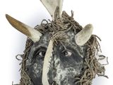 an image of a mask with horns on a white background