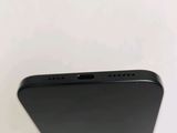 the back of a black iphone with the camera facing towards the camera