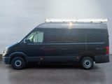 a black van that is parked in a parking lot