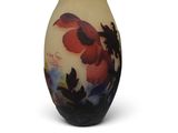 a vase with a floral design on it on a white background
