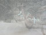une photo d'une photo d'un chat en train d'écrire sur le mur