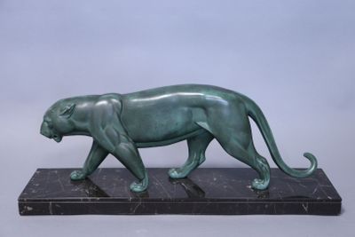 bronze sculpture of a panther on a marble base