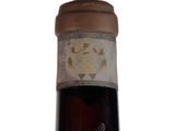 a close up of a bottle of wine on a white background