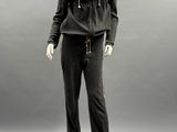 the mannequin is wearing a black hoodie and pants