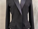 an image of a woman ' s suit on a mannequin dummy