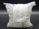 a large bag of white plastic bags on a table