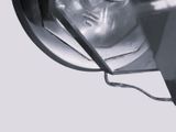a black and white photo of a person with headphones on