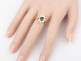 an image of a woman ' s hand with a ring on it ' s finger