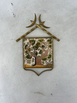 a picture of a birdhouse with a tree on it