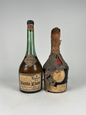 deux bouteilles d'alcool posées l'une à côté de l'autre sur une surface blanche