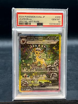 a close up of a pokemon card in a plastic case