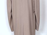 an image of a mannequin mannequin wearing a brown coat