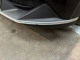 a close up of the front bumper of a car