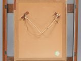 a picture of a wooden easel with a picture in it