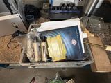 a picture of a box of tools on the floor