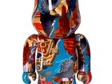 a bear that is painted with many pictures on it