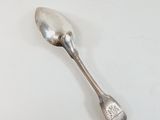 a spoon that is sitting on a table