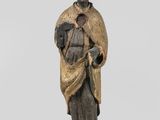 an image of a statue of a man with a hat and robe
