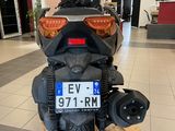 a motorcycle that is parked inside of a building
