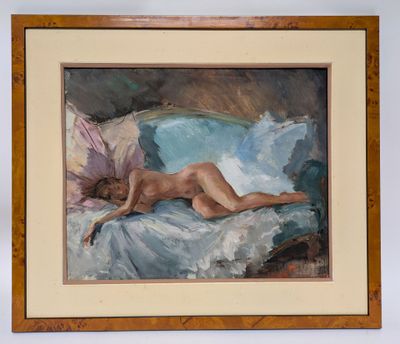 painting of a nude woman laying on a bed in a wooden frame