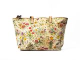an image of a handbag with flowers and butterflies on it