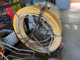 a cart that has a bunch of wires on it