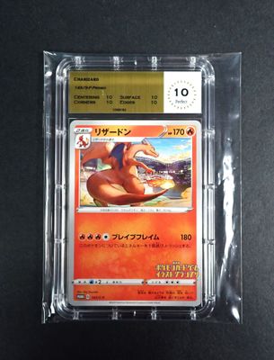 a close up of a pokemon card in a plastic case