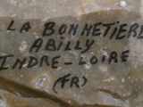 a rock with writing on it that says la bonnnetieree abbey