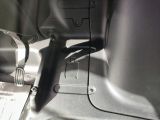 a close up view of a car ' s dashboard with a remote control