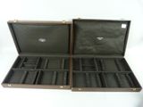 two cases that are open on a white surface