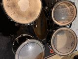 a close up view of a drum set on a table