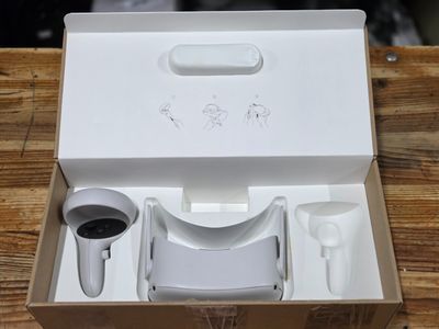 a box that has a cup and a cup holder inside of it