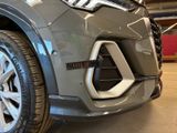 a close up of the front bumper of a car