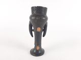a black vase with an elephant head on it