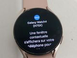a smart watch with a text message displayed on the screen