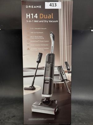 a box of a vacuum that is sitting on the floor