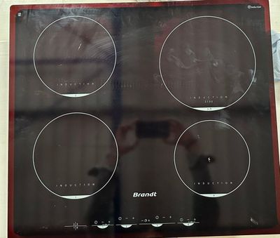 a picture of a picture of a stove top with four burners