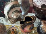 many different vases on the table with pictures on them