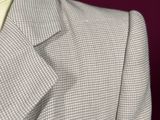 a close up of a suit on a mannequin mannequin mannequin mannequin mannequin mannequin mannequin mann