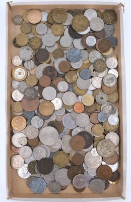 an open box filled with lots of different types of coins