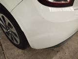 a close up of a car ' s rear bumper