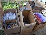 several boxes of assorted items are stacked on top of each other