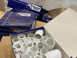 a box full of white cups sitting on a table