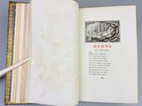 an open book with a pen sitting on top of it