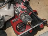 a picture of a cordless drill and a cordless hammer