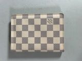 louis vuitton damier wallet in white and black