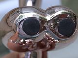 a close up of a person ' s hand holding a faucet