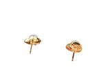 two pairs of gold and pearl stud earrings on a white background